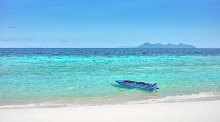 A small boat by the beach, Semporna district, Borneo, Malaysia.