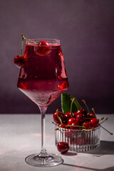 Cherry sparkling cocktail with fresh ripe cherries © Victoria Kondysenko