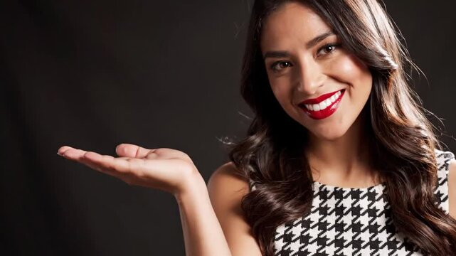 Smiling Woman Holding Hand Out Portrait.