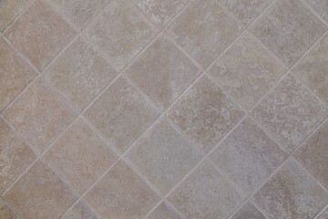 Fototapeta premium Tile floor with a pattern of squares