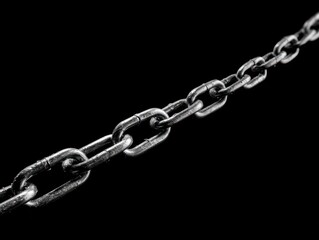 minimal chain segment isolated on a black background