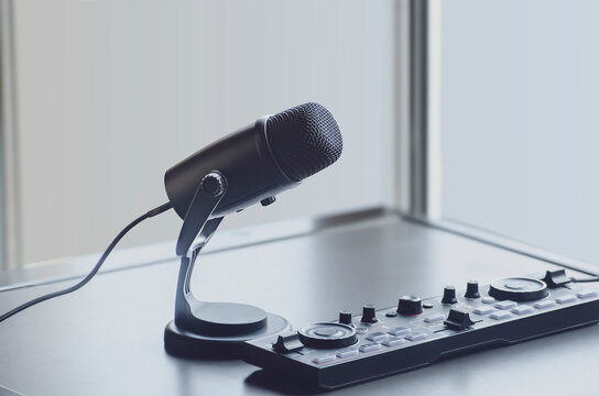 Desktop microphone with audio mixer controller setup