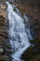 Obraz premium Impressive, scenic, powerful Piljski waterfall on Stara planina (Balkan mountains) near Topli Do, long exposure blurred motion