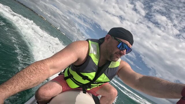 Riding personal watercraft on the shores of Rio Hato in Panama on vacation fun ocean play