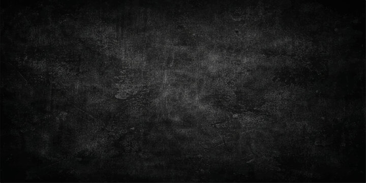 A vintage dark grey grunge paper background with a blank black chalk texture on an old dirty concrete wall surface for a textured design backdrop