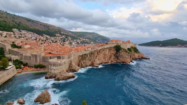 The historic Fort Lovrijenac on a rocky cliff and the blue Adriatic Sea in Dubrovnik, Croatia, on a sunny day