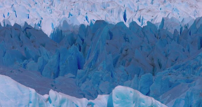 4K video; Sun and shadow moving over crevasses of the Perito Moreno glacier, Patagonia, Argentina