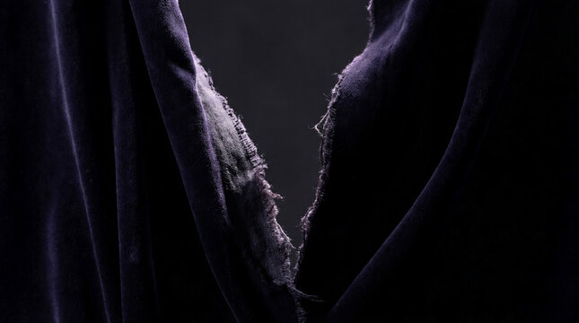 Extreme macro torn purple velvet fabric, frayed edges, deep folds and shadows, temple veil rending, Good Friday