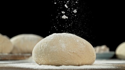 Obraz premium The dough on the kitchen table