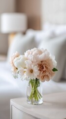 Elegant Pastel Flower Bouquet in Glass Vase on Table