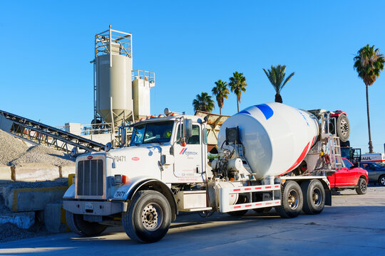 Perris, California - December 6, 2025: Concrete Mixer Truck at Industrial Cement Batch Plant in California