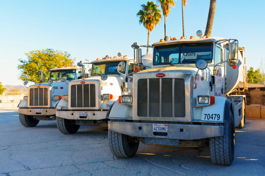 Perris, California - December 6, 2025: Industrial Peterbilt Concrete Mixer Trucks Parked in Perris California