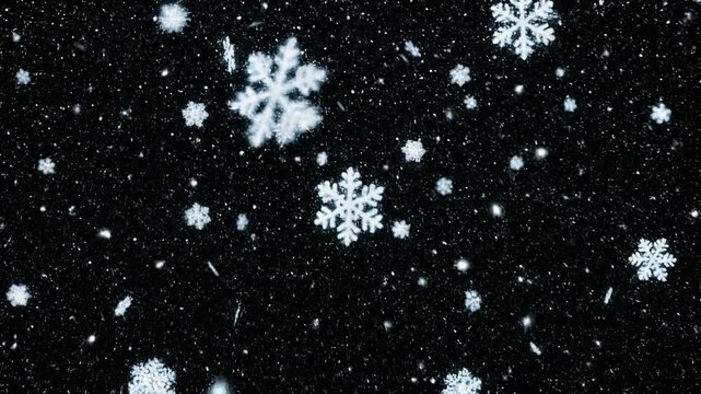 Snowflakes falling on a black background