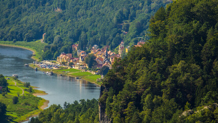 Elbe river with village in saxon switzerland