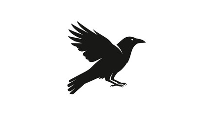Fototapeta premium Black bird in mid flight motion.