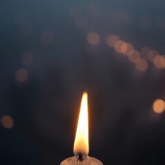 Fototapeta premium Solitary flame amidst a candlelight vigil. Use it for holiday, memorial, vigils 