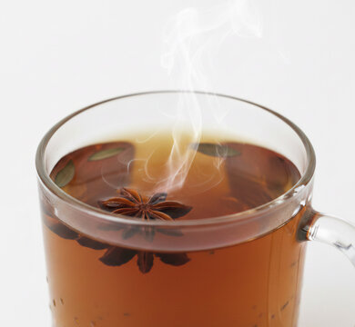 Hot Star Anise Honeybush Tea., on sold white background