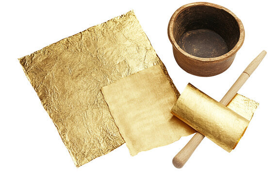 Gilders Working with Gold Leaf Sheets and Burnishing Tools