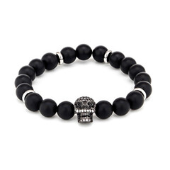 Obraz premium A sophisticated studio shot of a black gemstone bracelet. Highlighting the sleek surface, deep dark tones, and premium quality for modern jewelry retail and fashion marketing.