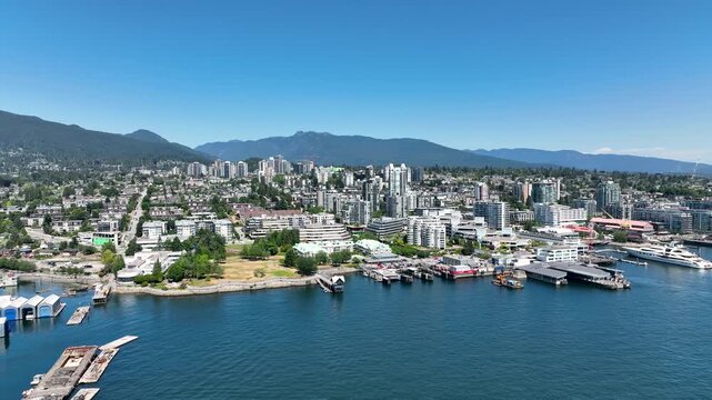 Aerial View of North Vancouver Waterfront and Lonsdale Quay with Mountains