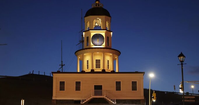 150 Year Old Town clock or Citadel Clock Tower, an historic landmark of Halifax. Background of prominent business finance and residential buildings downtown, Nova Scotia, Halifax, Canada