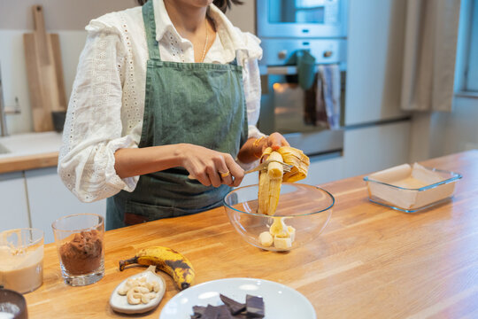 Indian Woman Preparing Banana Dessert