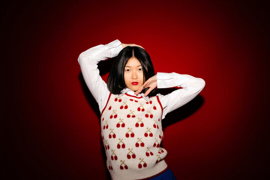 Serious model in artificial light