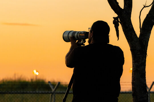 Photographer Capturing the Sunset