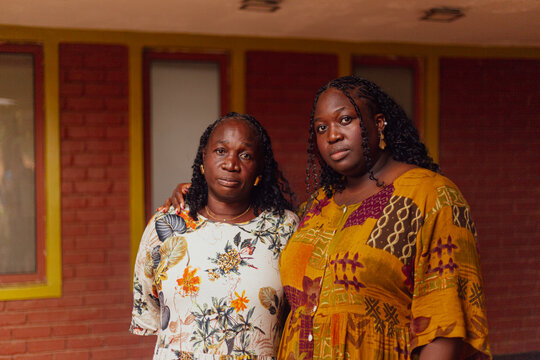 Serious portrait of mother and daughter