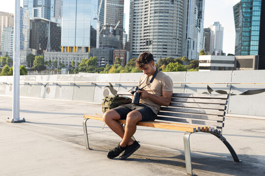 Man focus on his camera in Melbourne Australia city