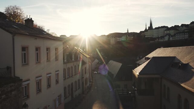 A street in Luxembourg along the medieval city wall with the Ville-Hout district in the background