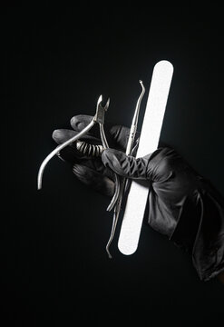 Manicurist's Tools In Hand