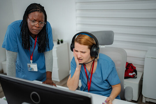 Stressed call center staff experiencing problems during busy workday