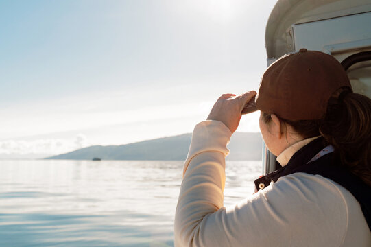 Woman Looking at Water from Boat
