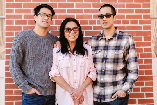 Mother and adult sons portrait