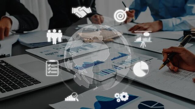 A professional business setting showcasing a meeting focused on global collaboration, data analysis, and strategic planning with charts and laptops on a table. Raster