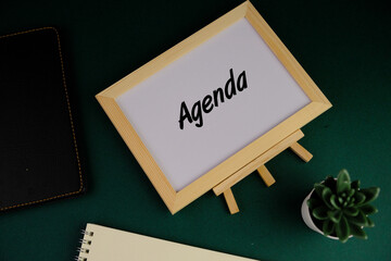 white board with the word agenda. today's agenda concept