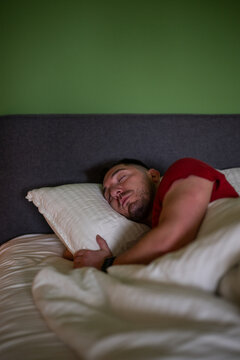 Young adult man sleeping