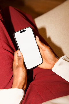 Woman With Cell Phone with a white screen at office. mockup phone