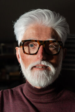 Senior Man With White Beard and Glasses
