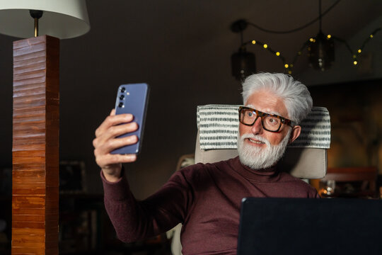 Senior Man Taking Video Call on Smartphone