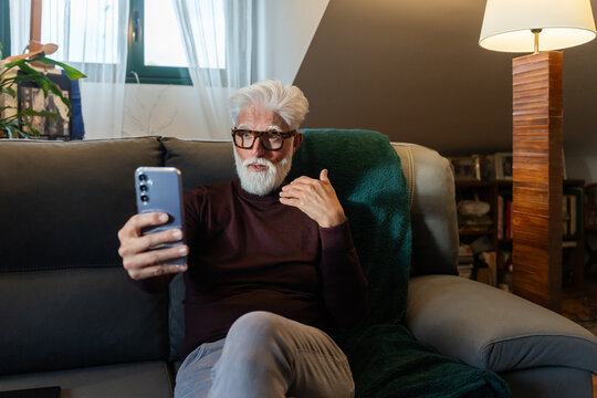 Senior Man Talking on Video Call