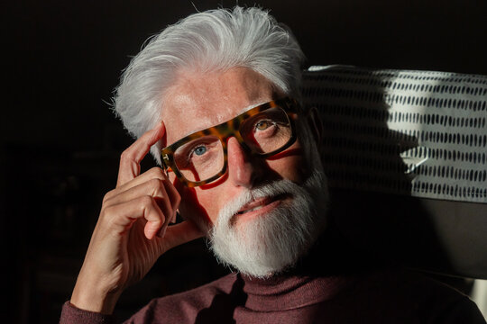 Pensive Senior Man With White Beard