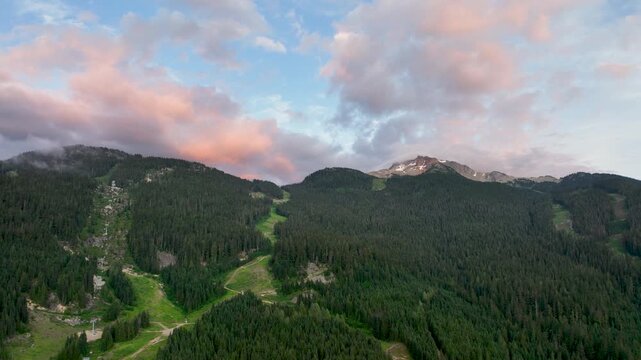 Whistler Creekside Sunset Aerial with Alpine Ski Runs and Coast Mountains, British Columbia