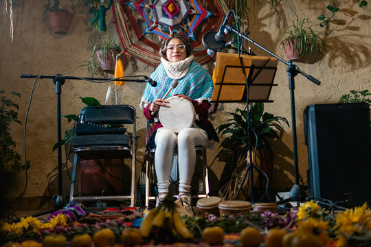 Musician playing traditional drum 