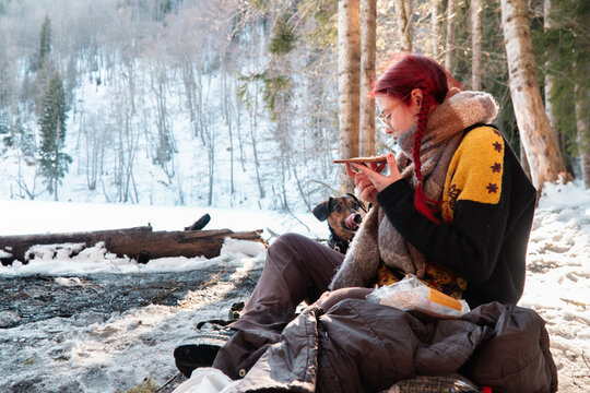 Eating on picnic with dog