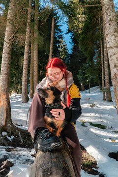 Togetherness with dog in forest