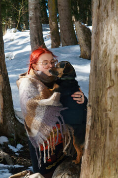 Togetherness with dog in forest