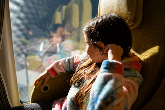 Young Girl Traveling by train