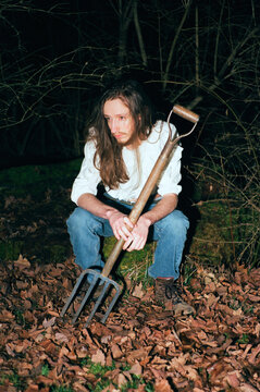 Portrait of an Androgynous Person Outside at Night